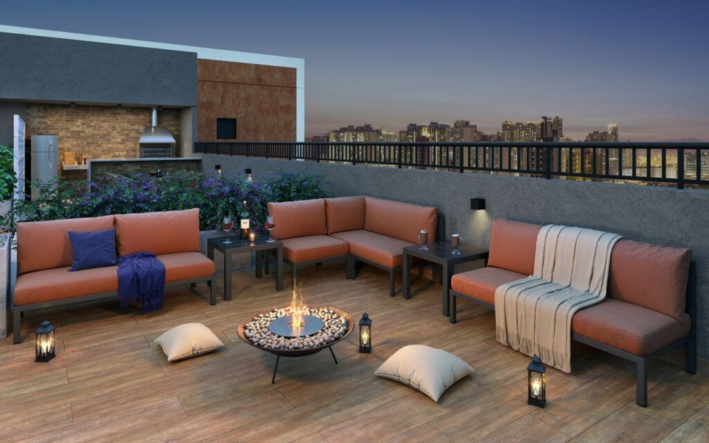 VINX Bresser Mooca, deck do terraço com sofás e lareira externa