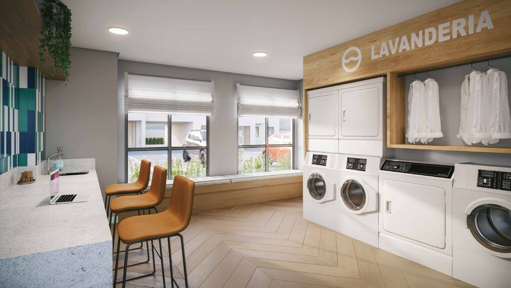 Novo Mundo Carrão, lavanderia coletiva com máquinas e bancada