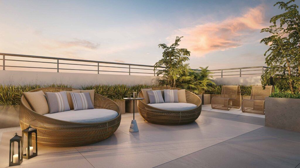 Novo Mundo Carrão, deck do terraço com espreguiçadeiras ao entardecer