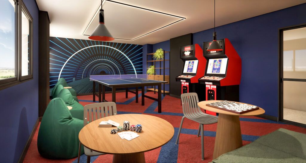 LYON Penha, sala de jogos com fliperama e pufes
