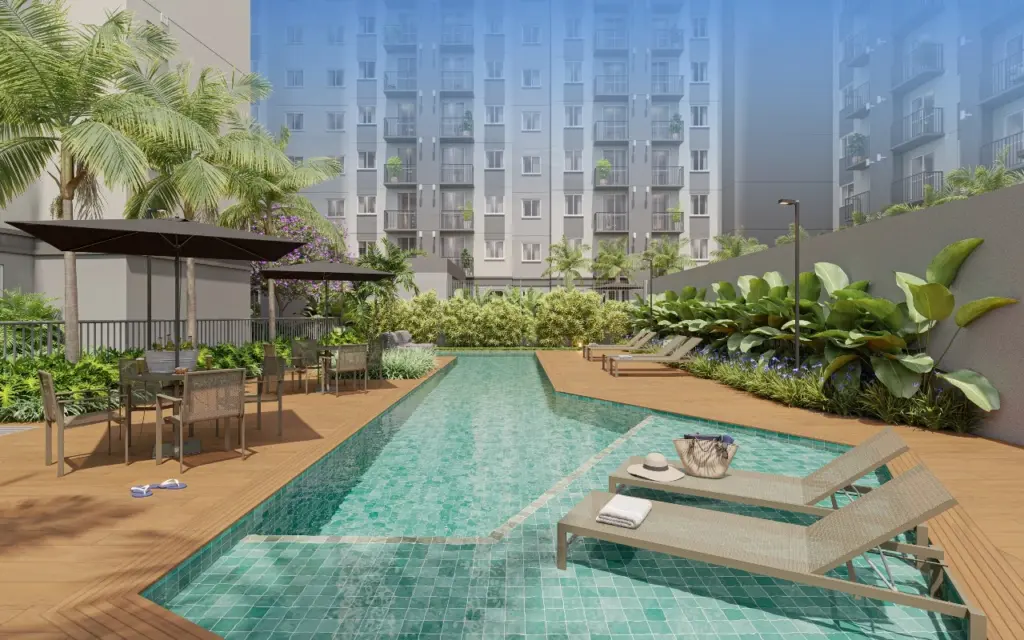 ELEV Anhaia Mello, piscina com paisagismo e as torres ao fundo